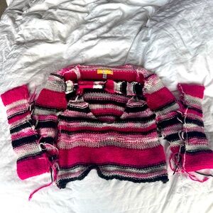 Urban Outfitters crochet long sleeved croptop in black, white, and hot pink